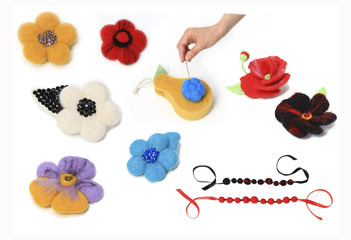 Workspace with tools needle and skeins of felting wool for jewellery master class top view