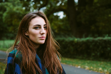 Portrait of a pretty teenage girl outdoors in the countryside