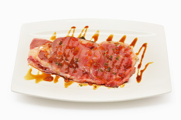 Matsusaka beef sliced on white plates Japanese style on white background