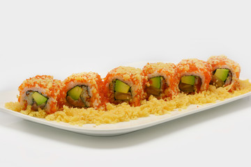Close up california sushi roll in white plate on white background