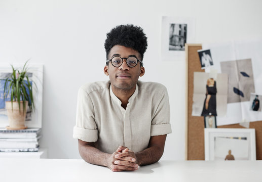 Portrait of young man in office