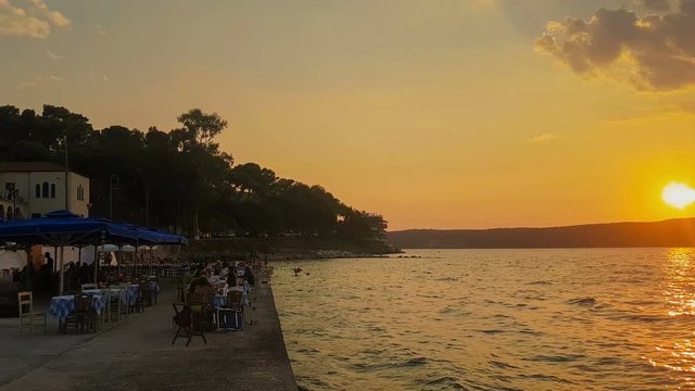 Famous touristic destination Pylos in Greece with people enjoying their summer.
