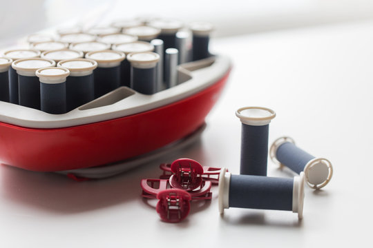 Hot Rollers Kit On Table With Hair Clips