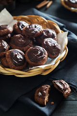 Self made chocolate cookies on a dark table