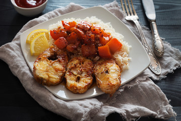 Slices of Fried cod with rice and pepper