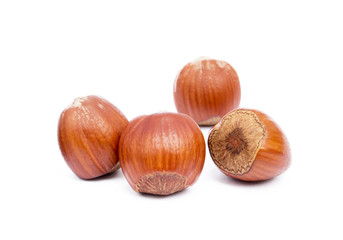 Group healty hazelnuts isolated on white background