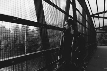 Handsome Man Walking on the Bridge