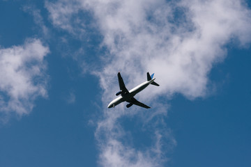 Airplane approaching airport, flying low altitude