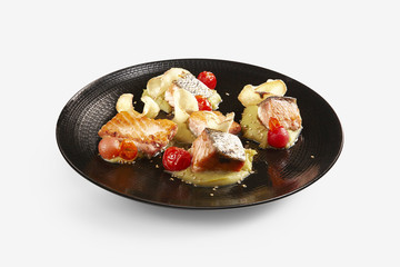Salomon cubes with yuca mushed and cherry tomato