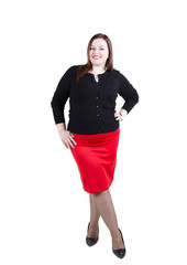 Fototapeta premium elegant chubby girl in office style stands in full growth isolated on white background