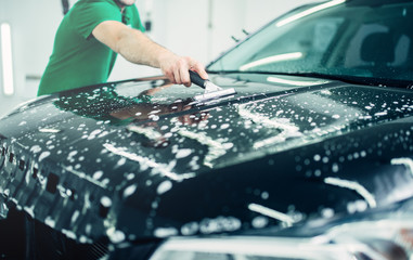 Specialist prepares car for protect against chips