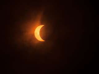 Obraz na płótnie Canvas Solar Eclipse and clouds