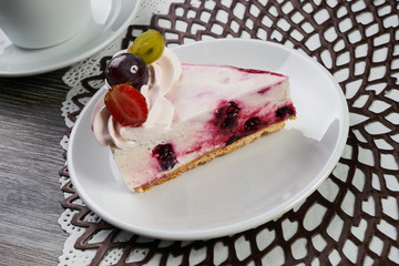 Slice of Delicious cheesecake with fresh berry