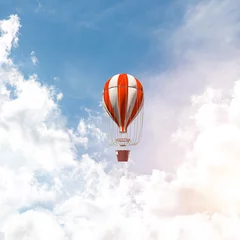 Fotobehang Flying hot air balloon in the air. © adam121