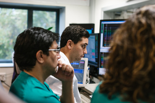 Doctors Operating Using Robot-Assisted Surgery