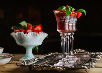 Strawberry and basil cocktails on silver tray