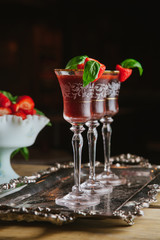 Strawberry and basil cocktails on silver tray