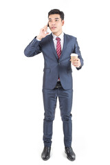 Businessman holding Smartphone and Coffee cup isolated on white background, Businessman with Technology Concept.