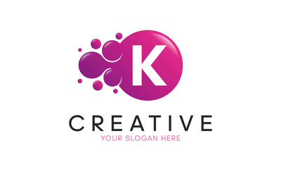 Dots Letter K Logo. K Letter Design Vector with Dots.