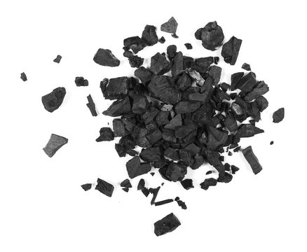 Pile black coal isolated on white background, top view

