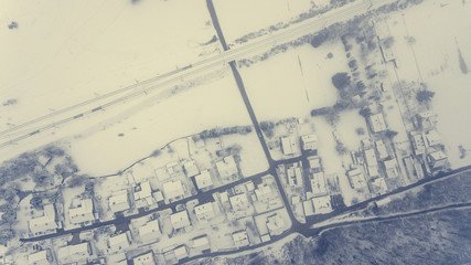 Top view of snow covered buildings.