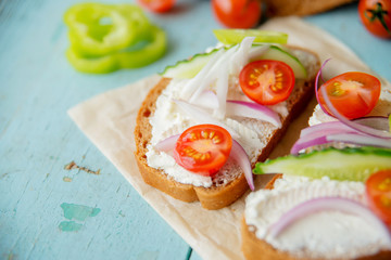 Canapes with herb pesto and edible nasturtium flowers