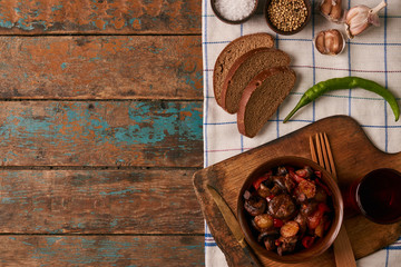 Baked vegetables potatoes with mushrooms, red pepper, garlic, onion