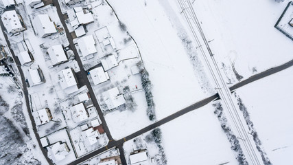 Top view of snow covered buildings.
