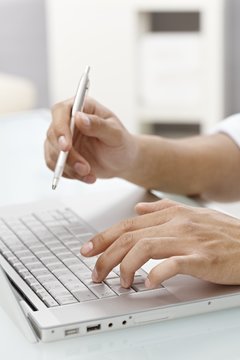 Closeup typing hands