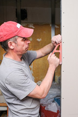 workers make repairs in the apartment