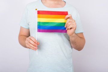 Man Holding LGBT Flag Close up. Concept of sexual minority