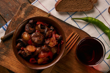 Baked potatoes with mushrooms, red pepper, garlic, onion