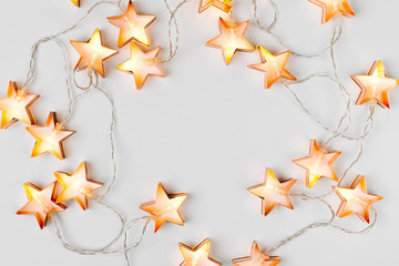 Star shaped Christmas lights frame. Flat lay, top view