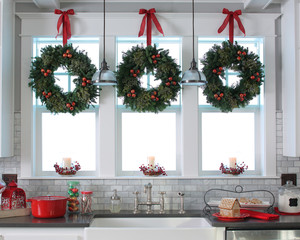 Festive kitchen windows with wreaths