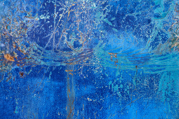 colored texture of a natural aged background of a painted surface. bottom surface of a boat close-up macro image
