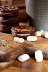 Aroma coffee candy chocolate cookies and spices on the wooden table. Christmas sweets. Dark wooden background. Close. Closeup.
