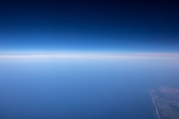 High altitude view between sky and space , in to the dark