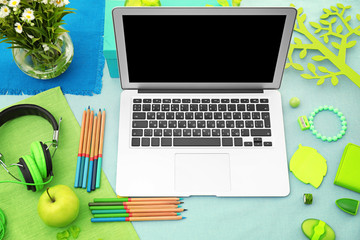 Comfortable blogger's workplace with modern laptop on table