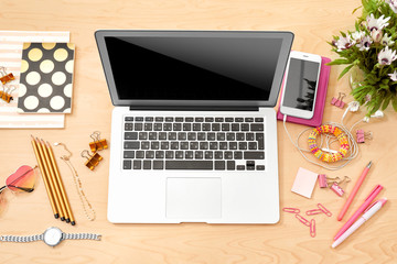 Comfortable blogger's workplace with modern laptop on table