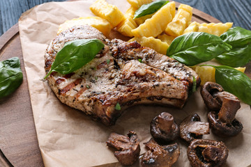 Delicious grilled steak frites on waxed paper