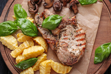 Delicious grilled steak frites on waxed paper