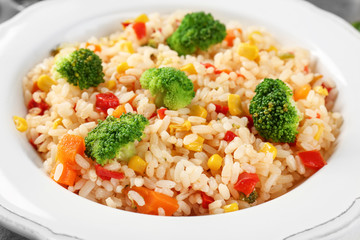 Plate with rice pilaf and broccoli, closeup