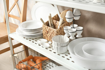 White kitchenware on storage stand indoors