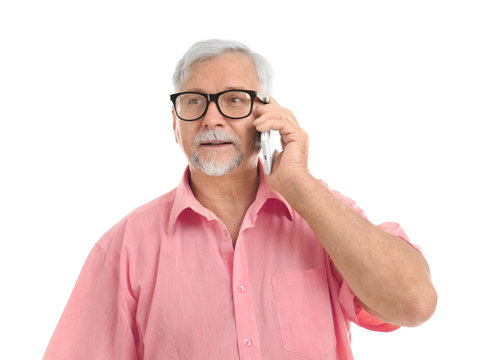 Elderly Man Talking By Mobile Phone On White Background