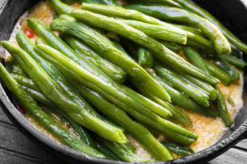 Frying pan with delicious green bean casserole, closeup