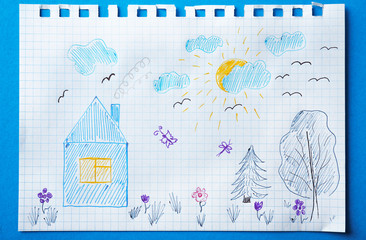 Child's drawing of house and forest on blue background