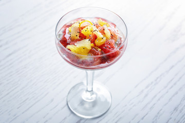 Glass with delicious chia seed pudding on table