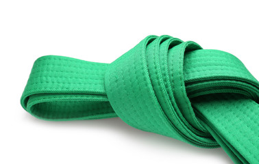 Green karate belt on white background