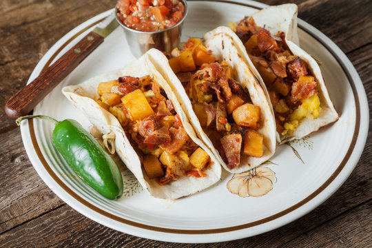 Chorizo Sausage, Eggs, Bacon And Potato Hash Breakfast Tacos