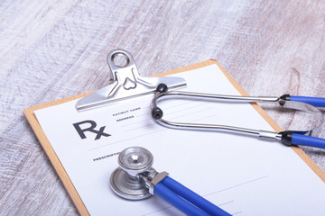 Closeup of medical stethoscope on a rx prescription